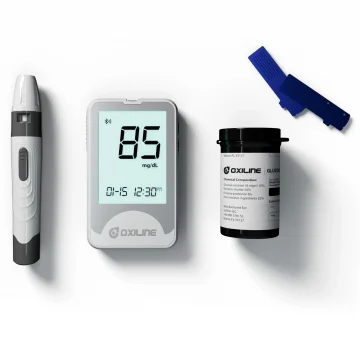 A glucometer kit lying on a white background, showing the device and accessories used for measuring blood sugar levels.